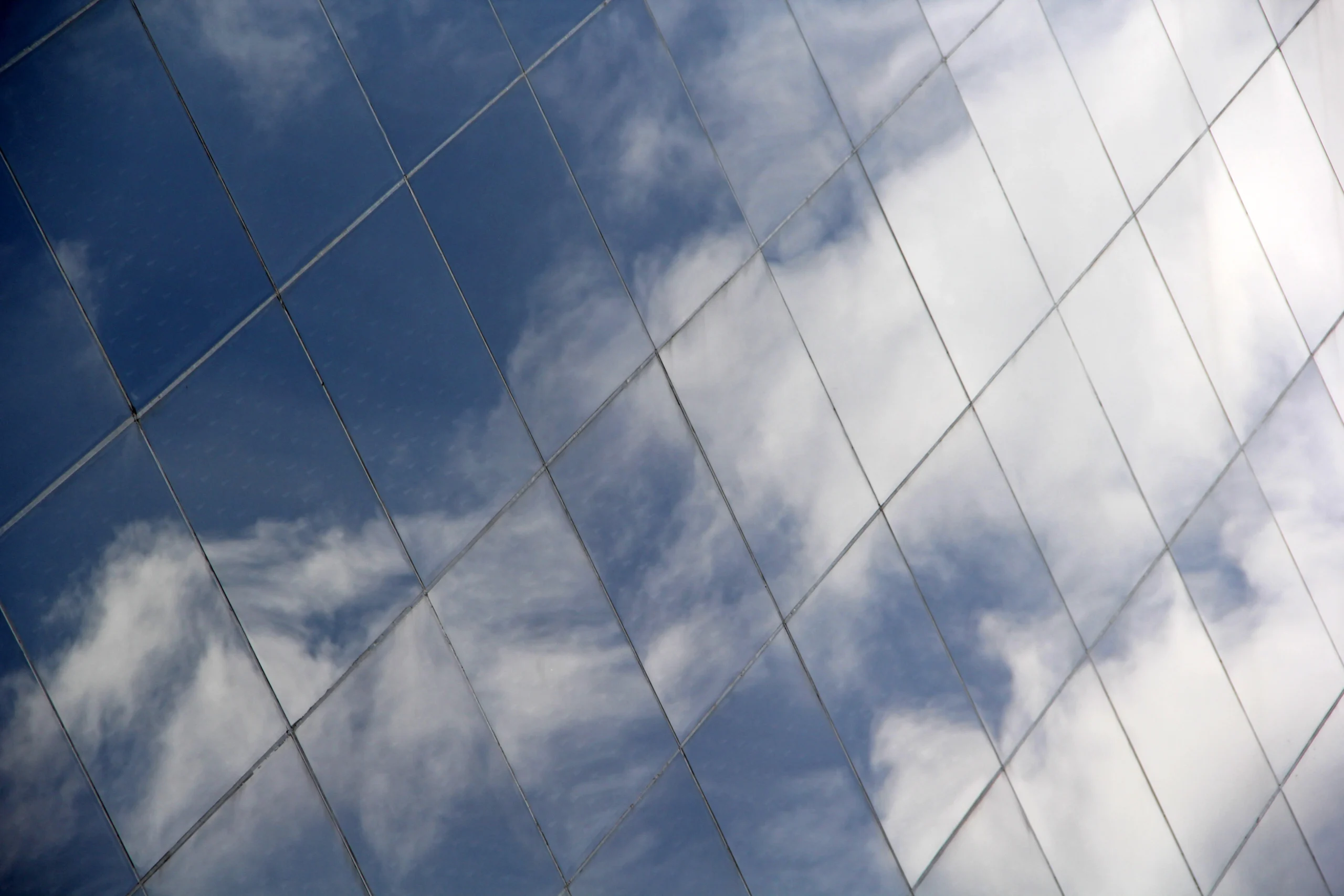low-angle-view-vapor-trails-sky