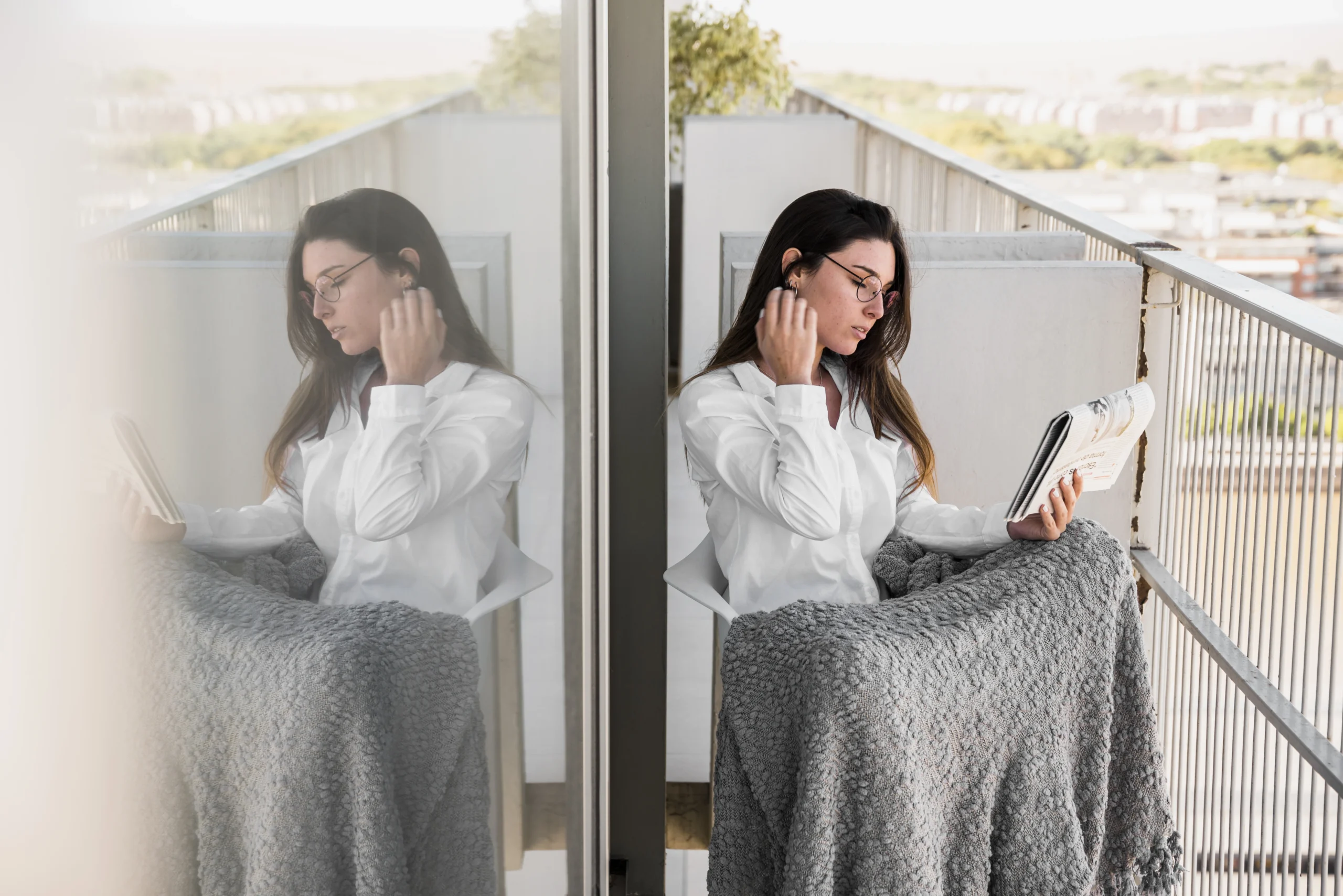 young-woman-sitting-chair-reading-newspaper